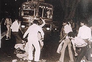 Sikh man being surrounded and beaten